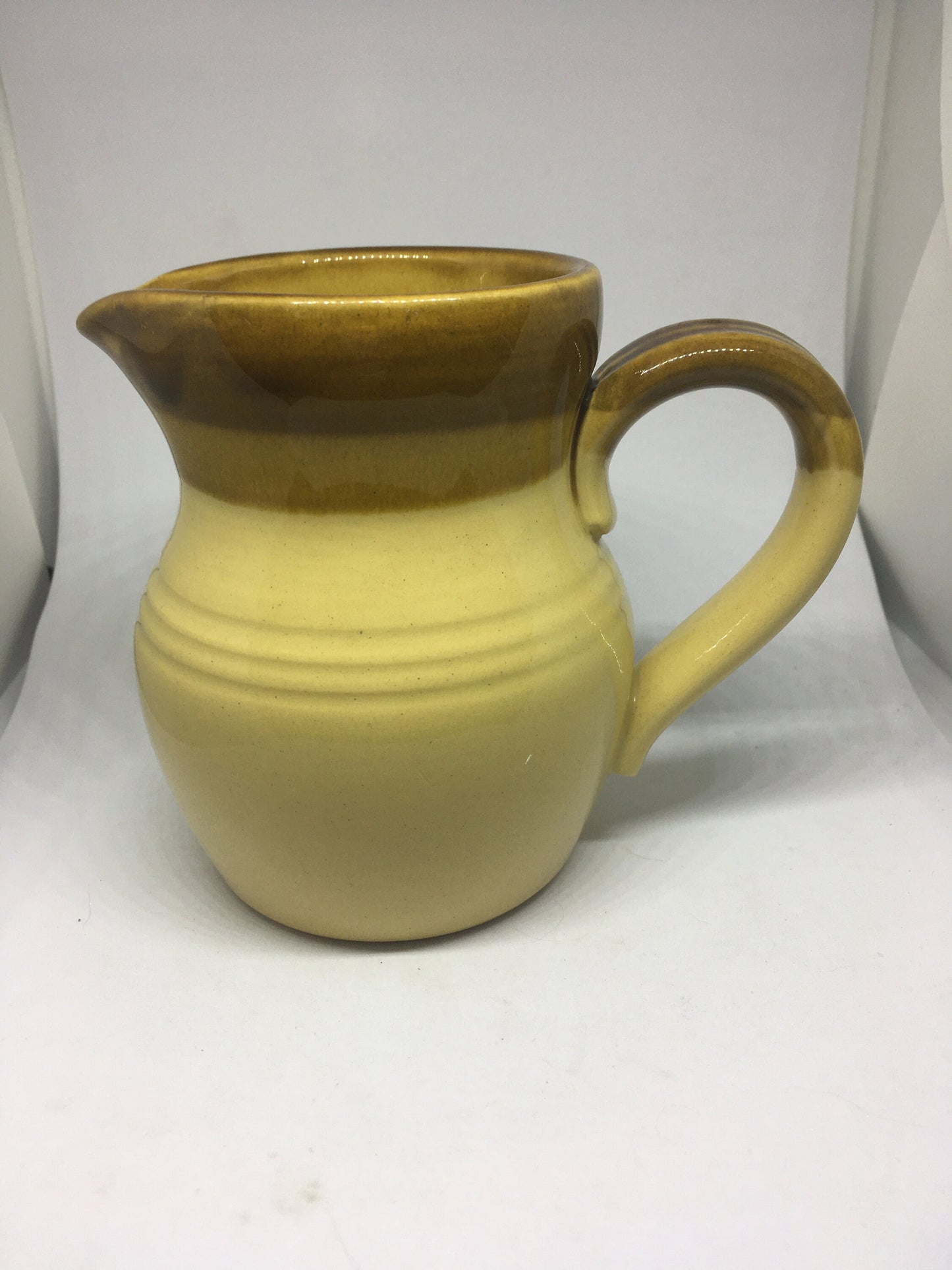 Ceramic Milk Water jug TG Green Church Gresley. Brown glaze.