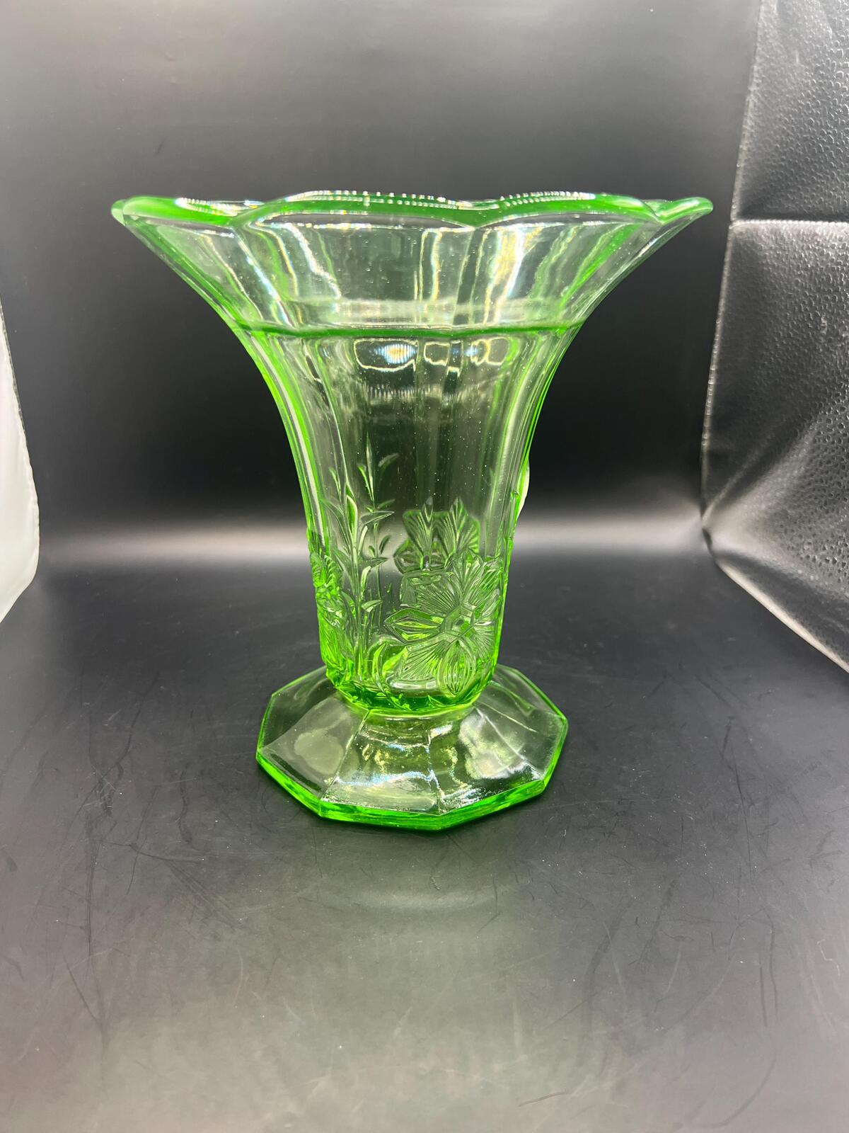 Vintage antique uranium glass vase. Octagonal base with flared ruffle rim and floral imprint.