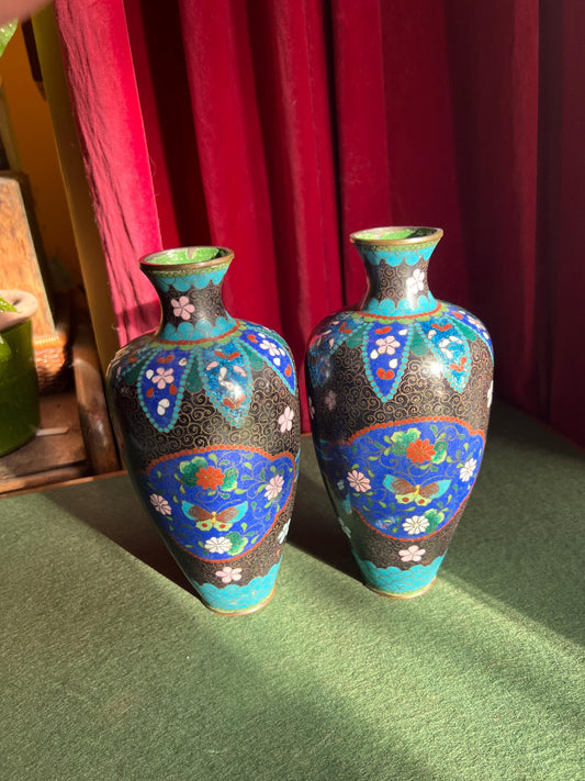 Pair of vintage antique cloisonne vases. Matching pair with intricate flowers and butterflies.