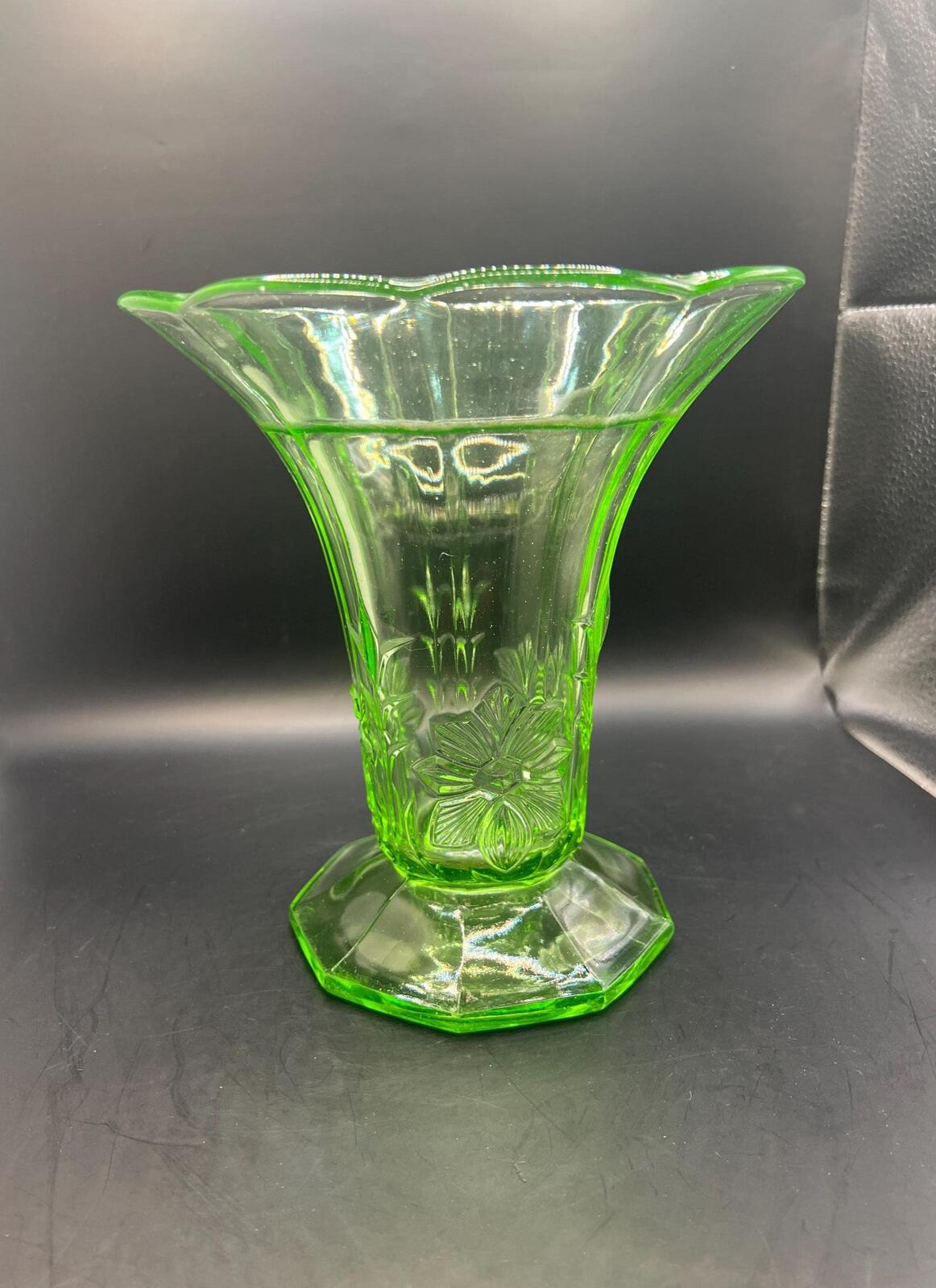 Vintage antique uranium glass vase. Octagonal base with flared ruffle rim and floral imprint.