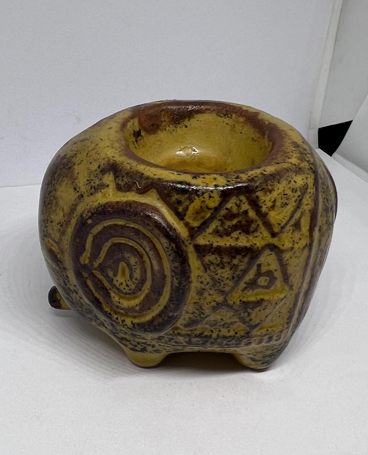 Ceramic Elephant tea light holder.