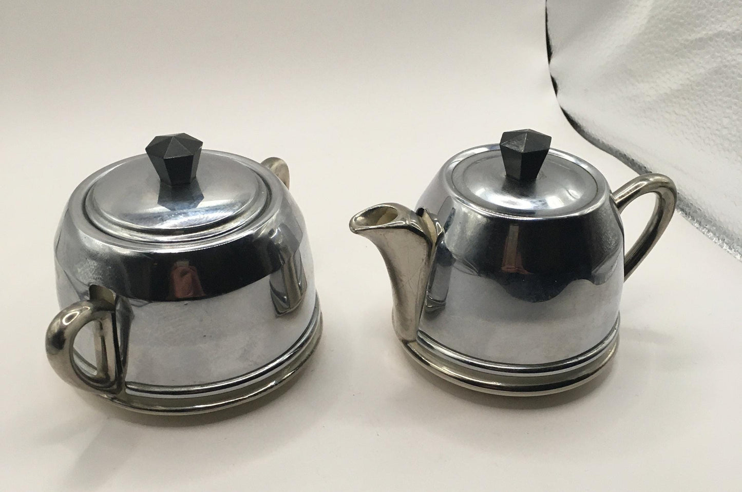 Vintage ceramic and metal insulated creamer and covered sugar bowl.