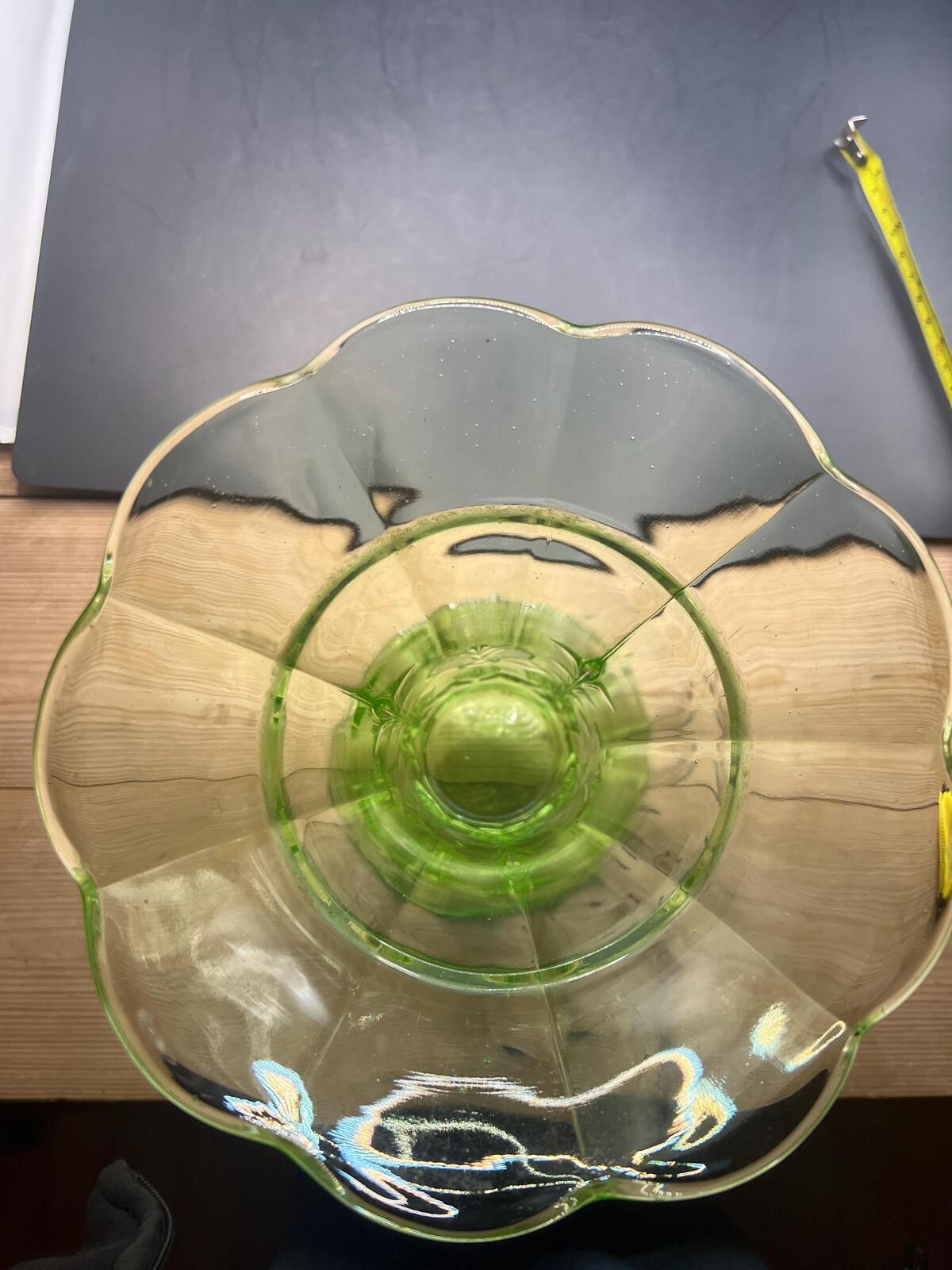 Vintage antique uranium glass vase. Octagonal base with flared ruffle rim and floral imprint.