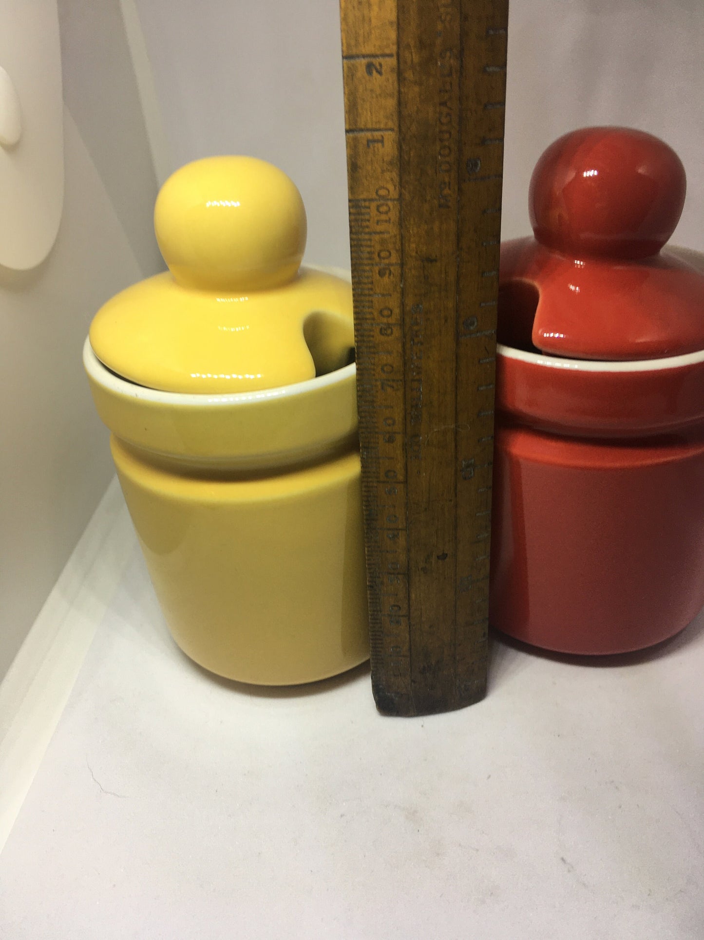 Ceramic lidded honey sugar pots. Vibrant red and yellow glazed set of vintage jam pots.