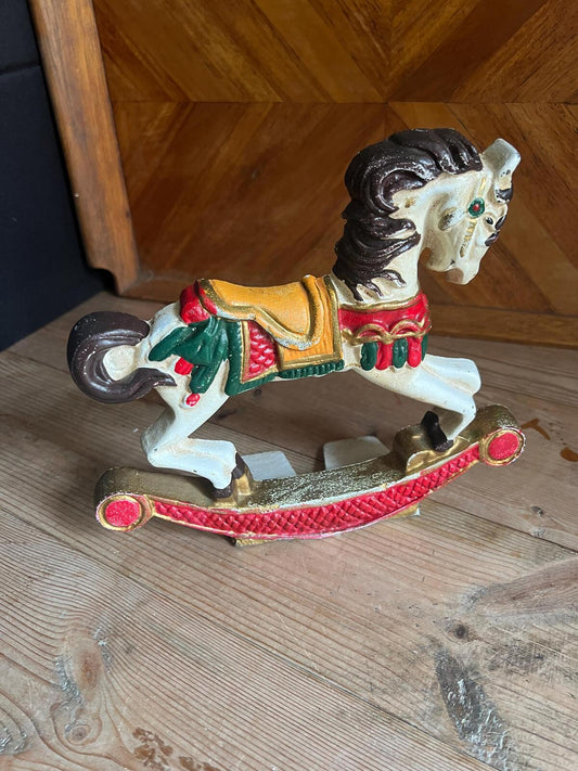 Vintage cast iron door stop. Rocking horse carnival style doorstop. Hand painted  colourful child's horse doorstop.