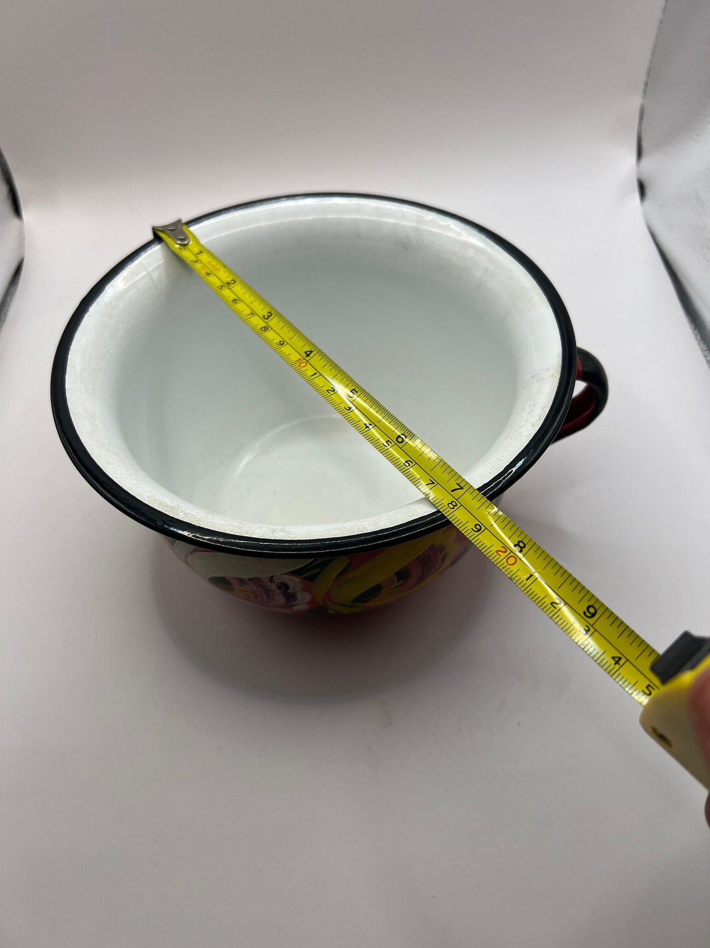 Polish enamelware chamber pot planter.