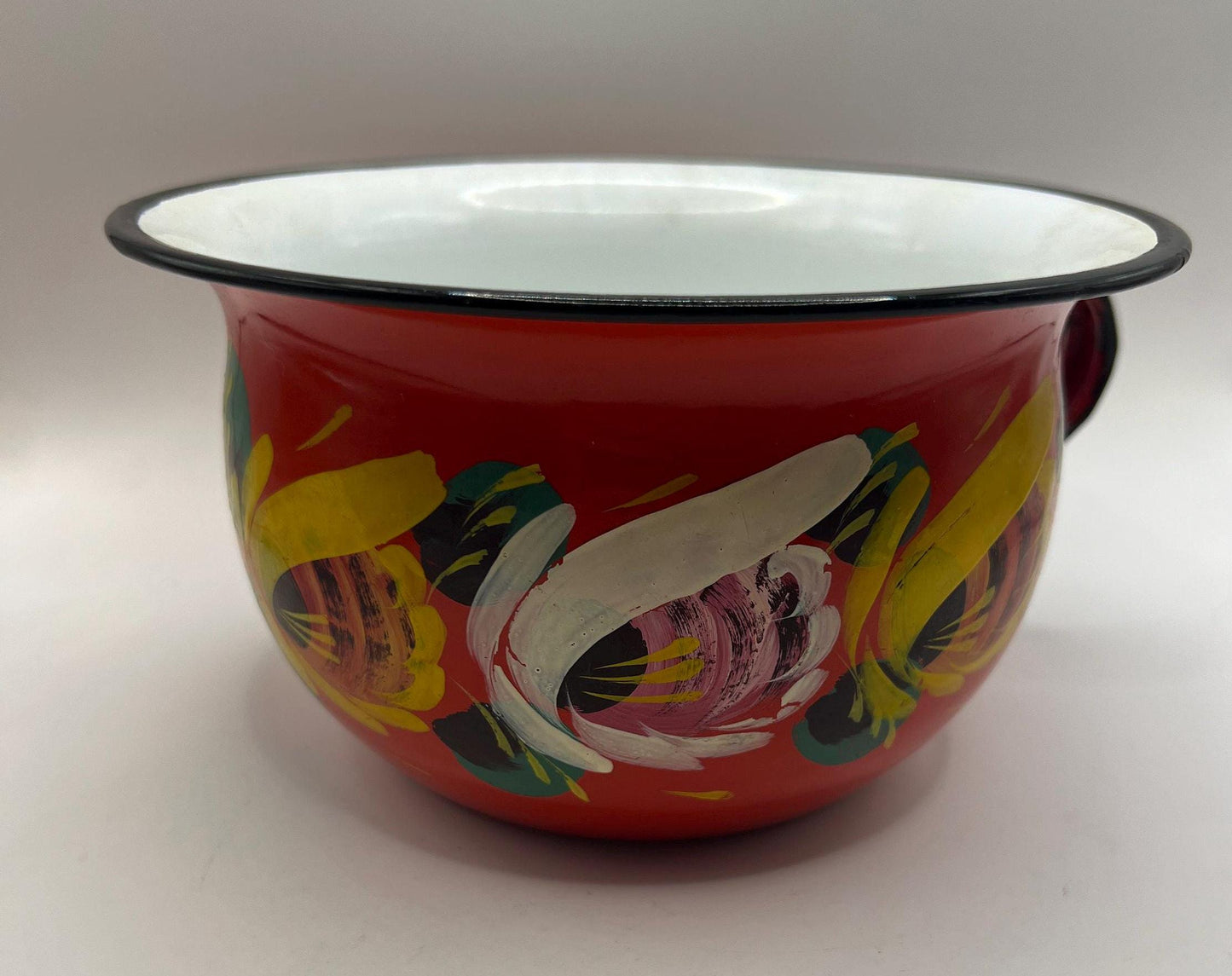 Polish enamelware chamber pot planter.