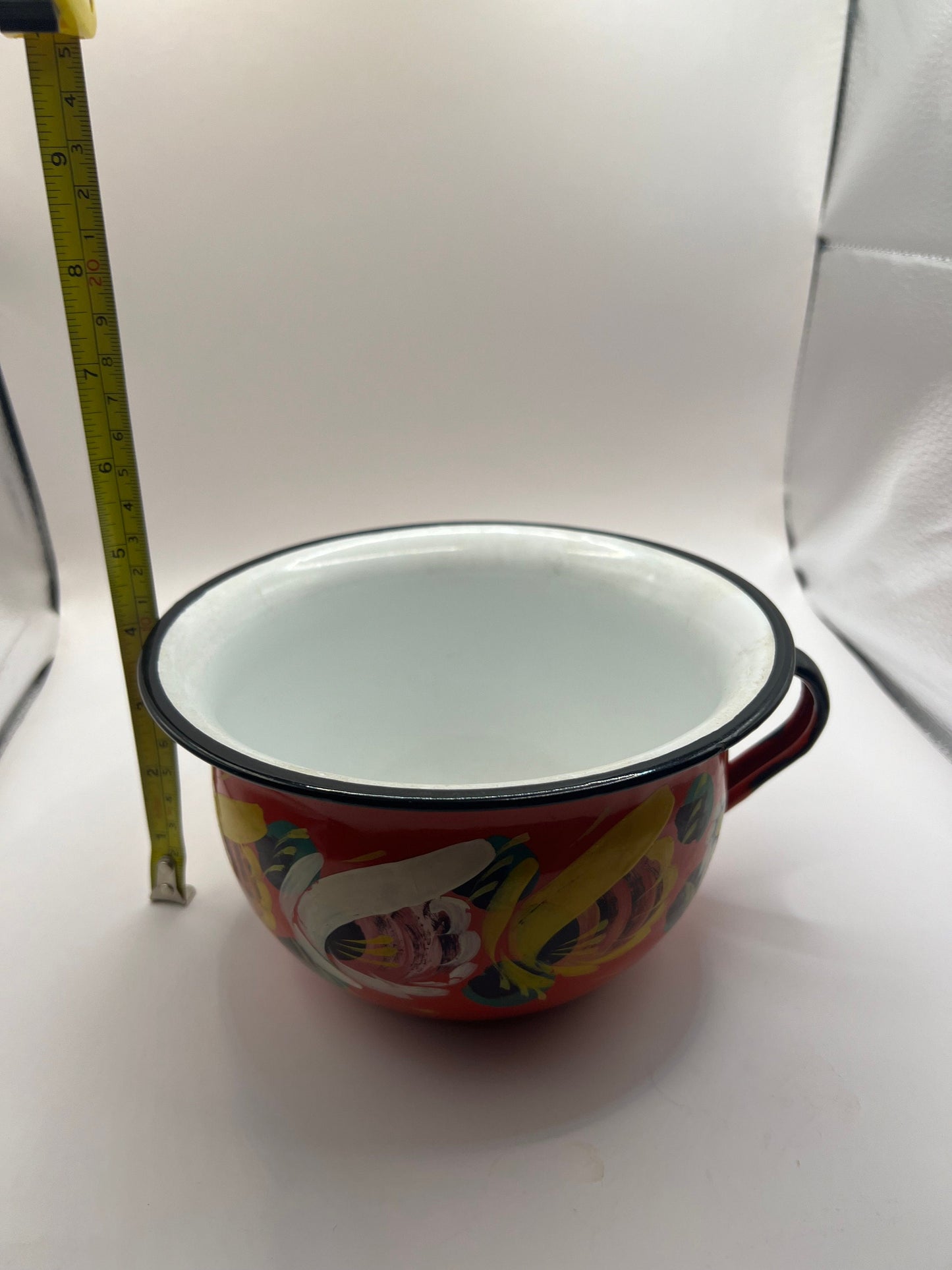 Polish enamelware chamber pot planter.