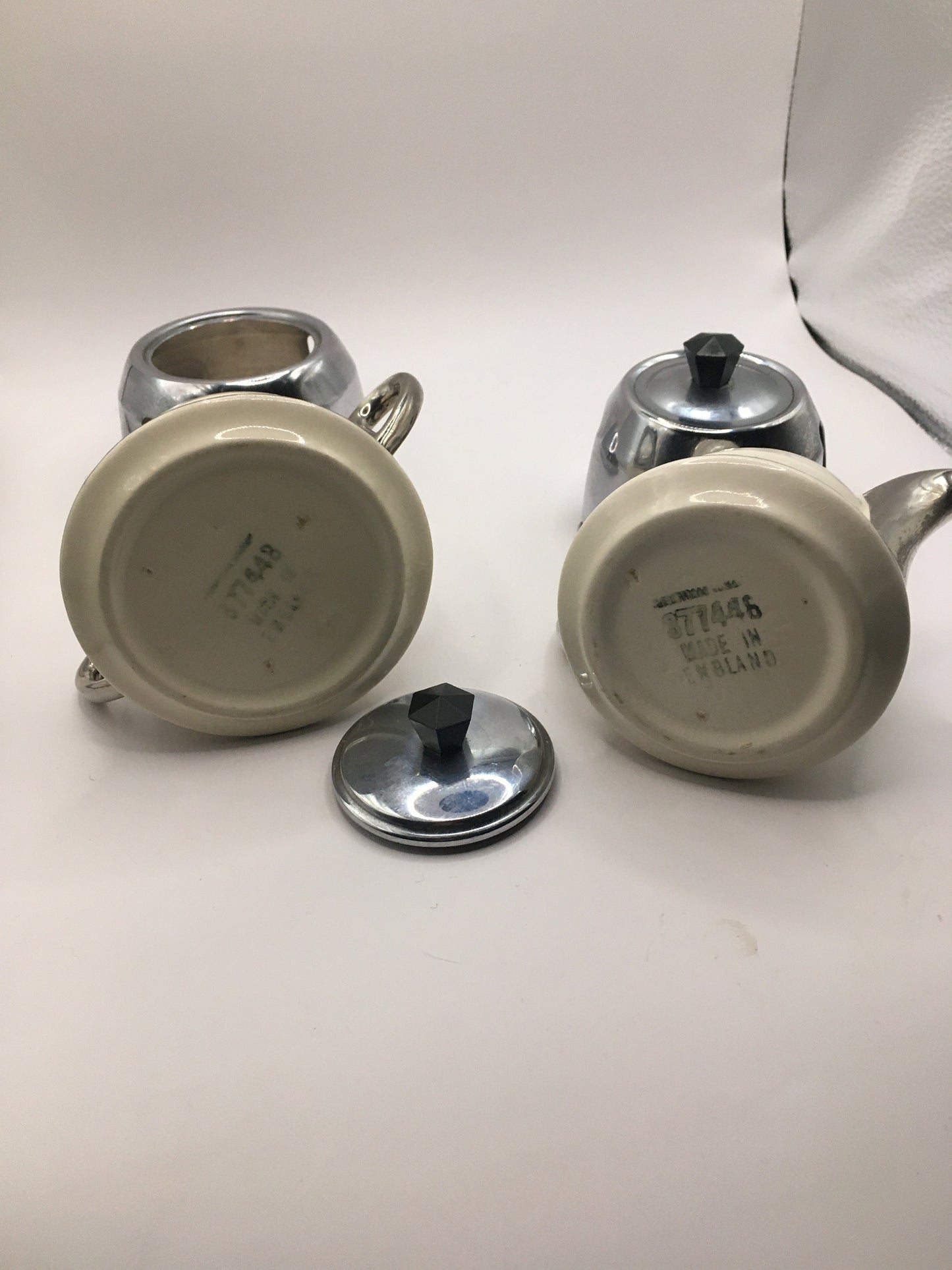 Vintage ceramic and metal insulated creamer and covered sugar bowl.