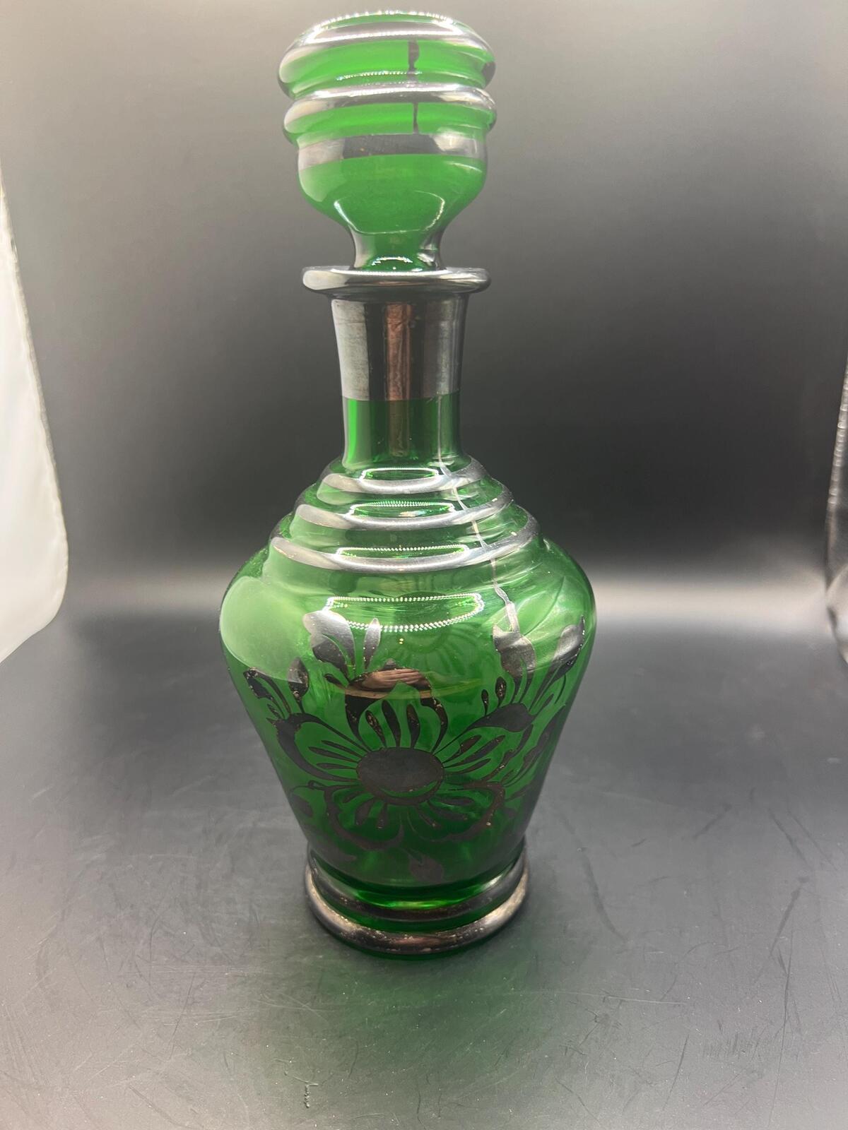 Antique Art Nouveau Emerald Green Glass Decanter with floral silver overlay and original stopper.