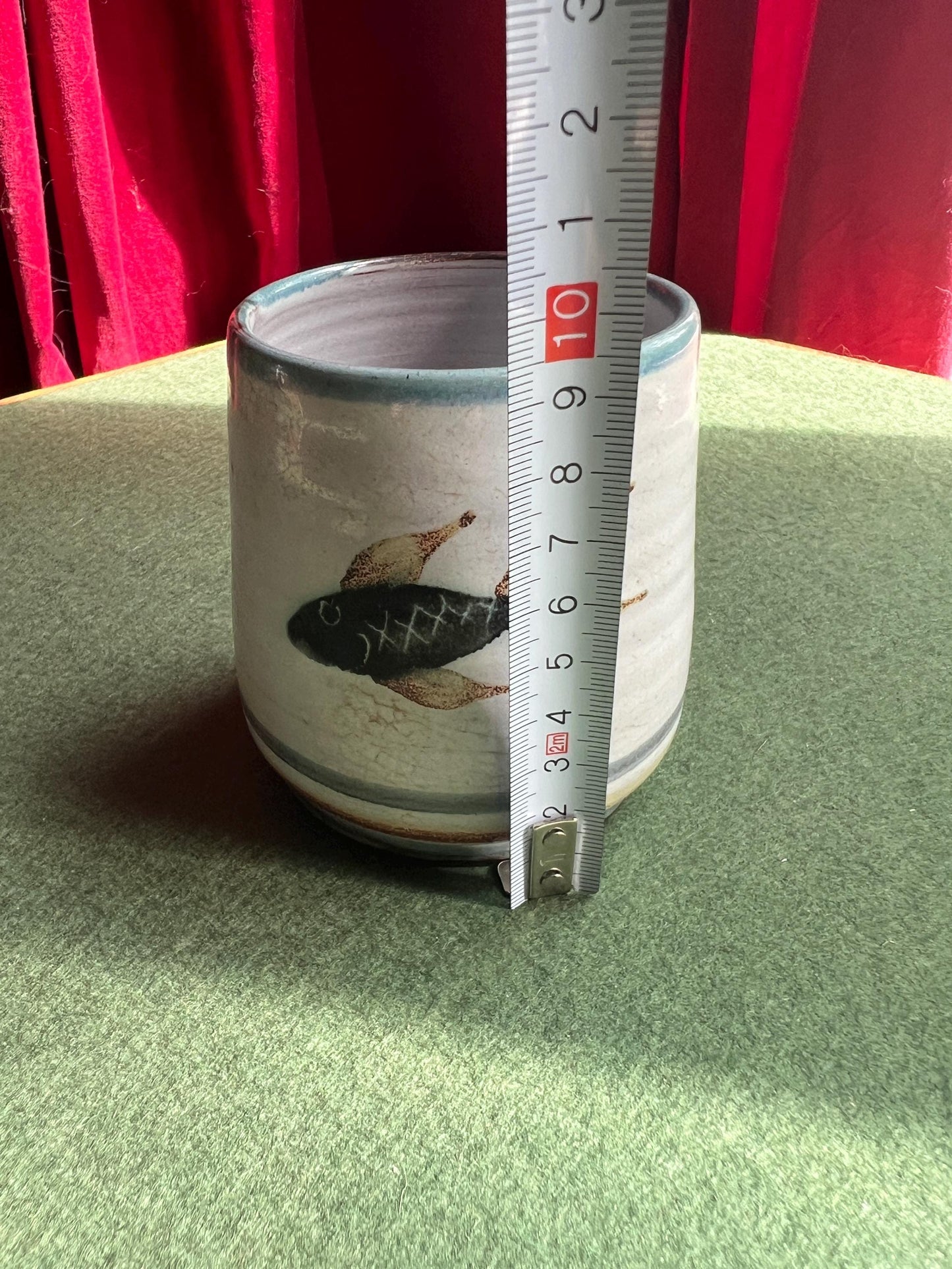 Studio pottery beaker planter. Hand painted fish design Signed Lamorna pottery.