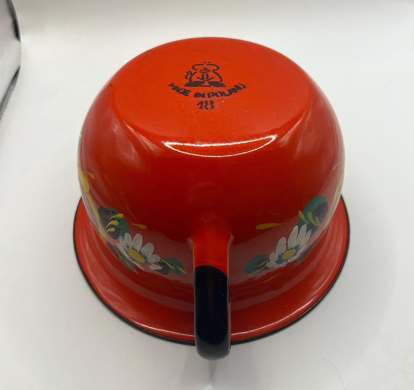 Polish enamelware chamber pot planter.