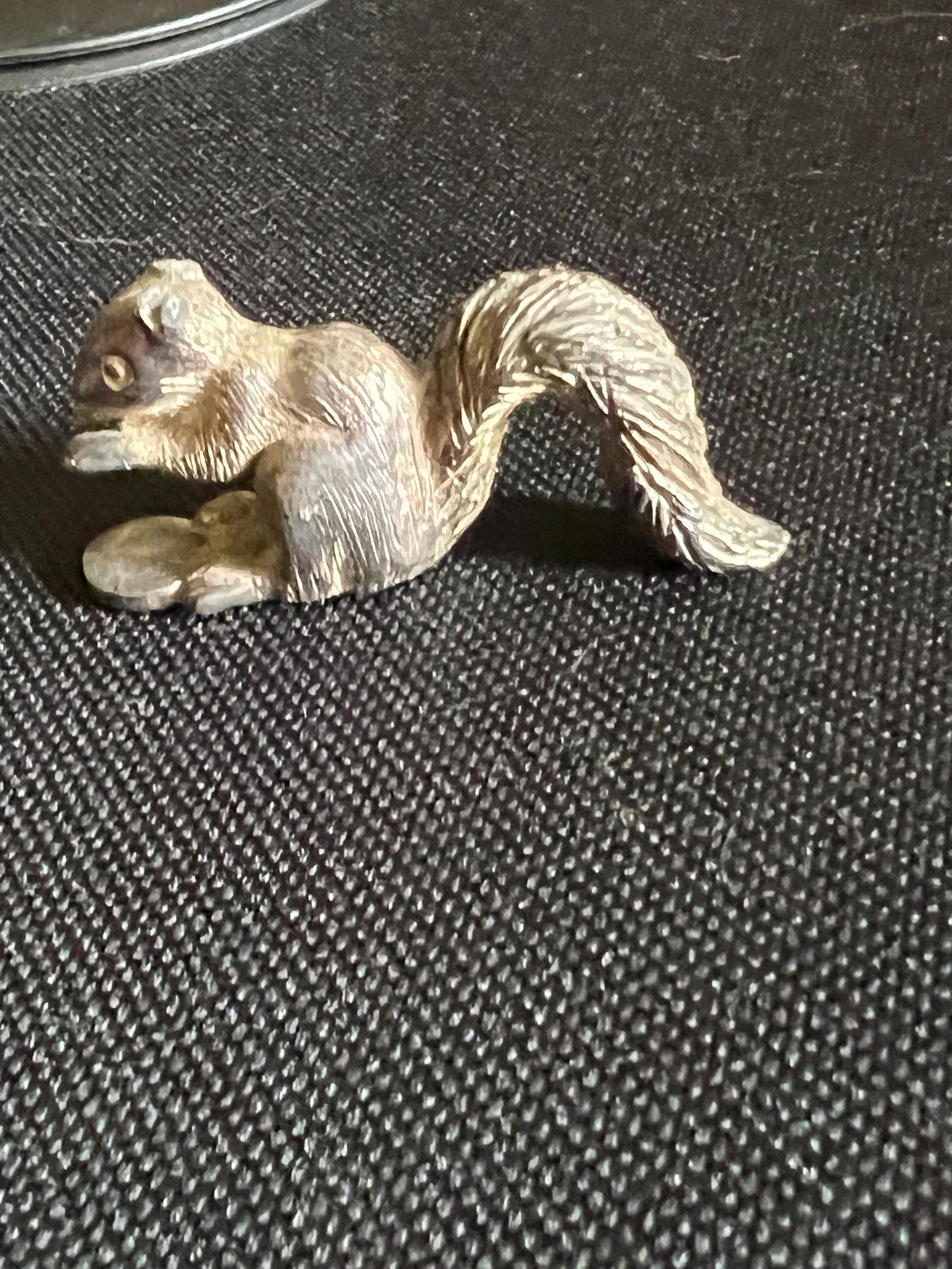 Vintage silver tone squirrel figurine. Miniature metal squirrel ornament.