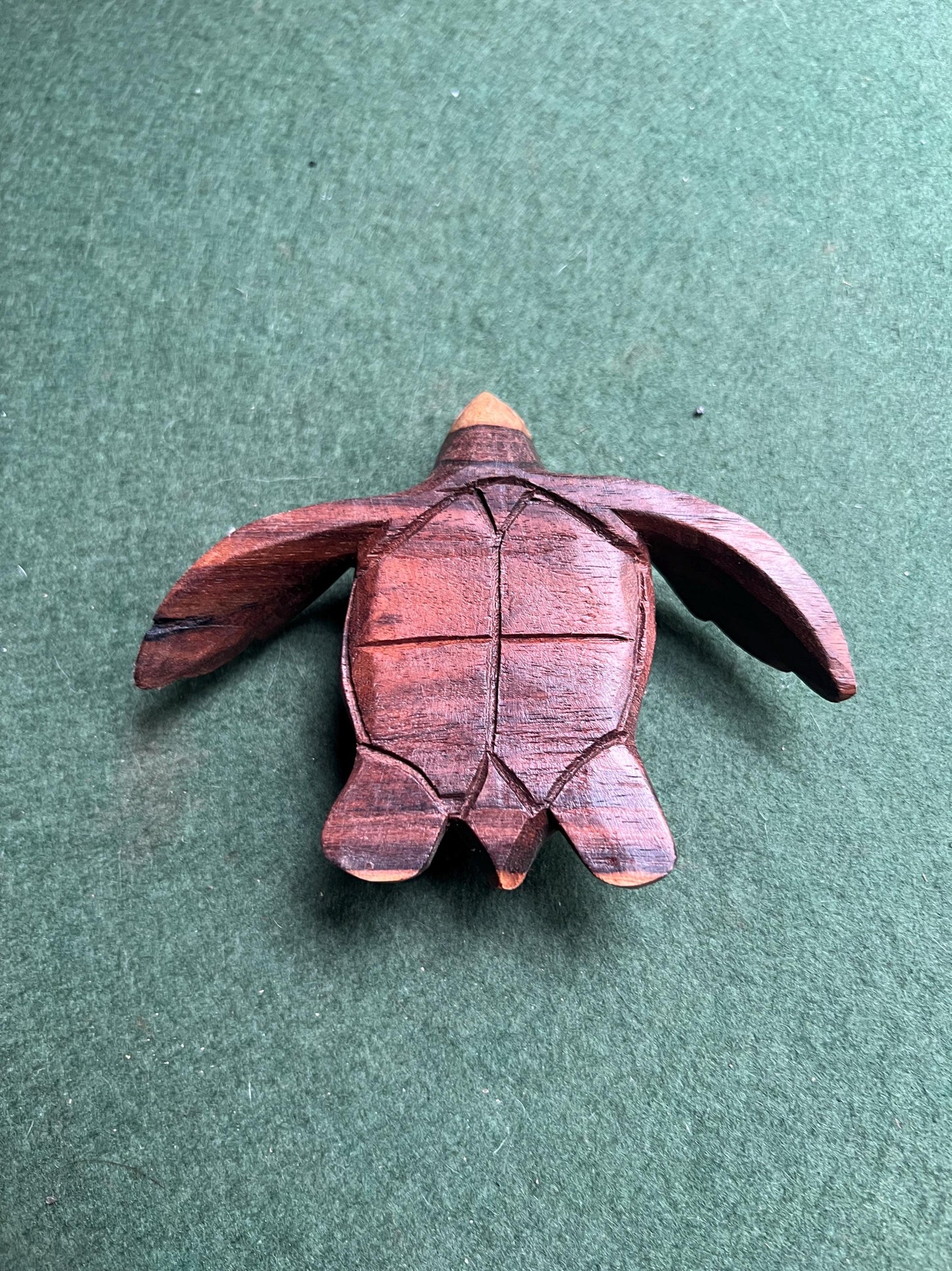 Hand carved Monkey wood swimming turtle figure.