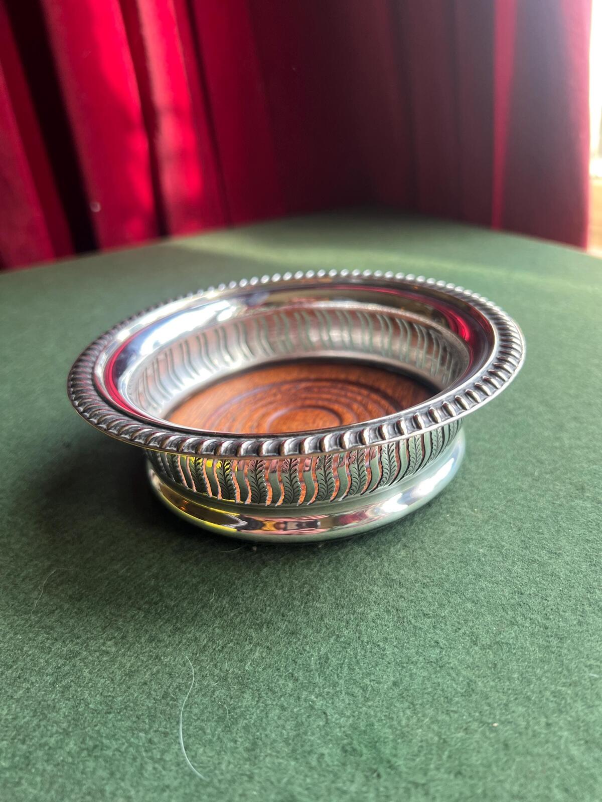 Antique vintage wine coaster. Silver plate and mahogany wood Barker Ellis style bottle coaster.