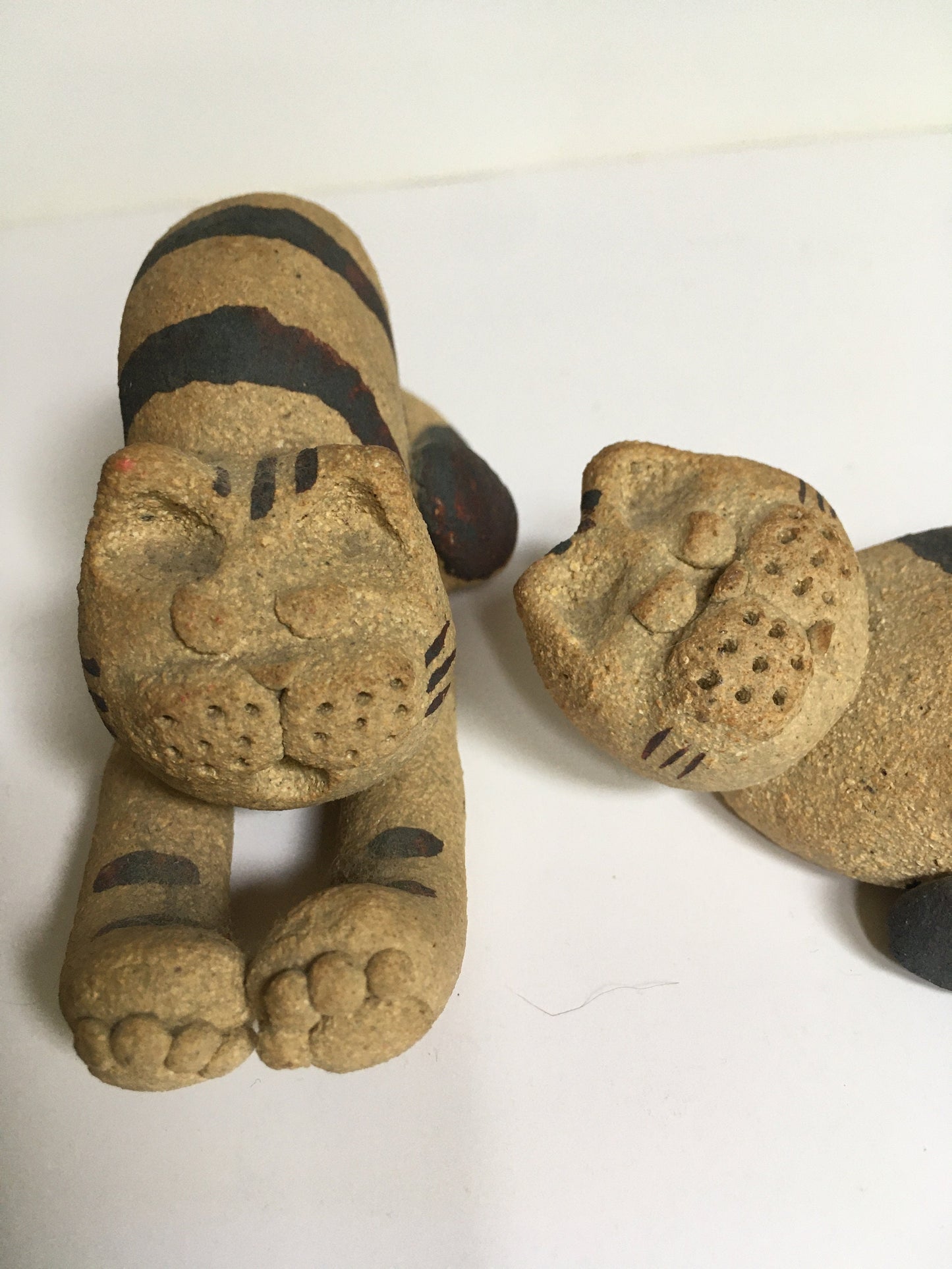 Cat figurines.