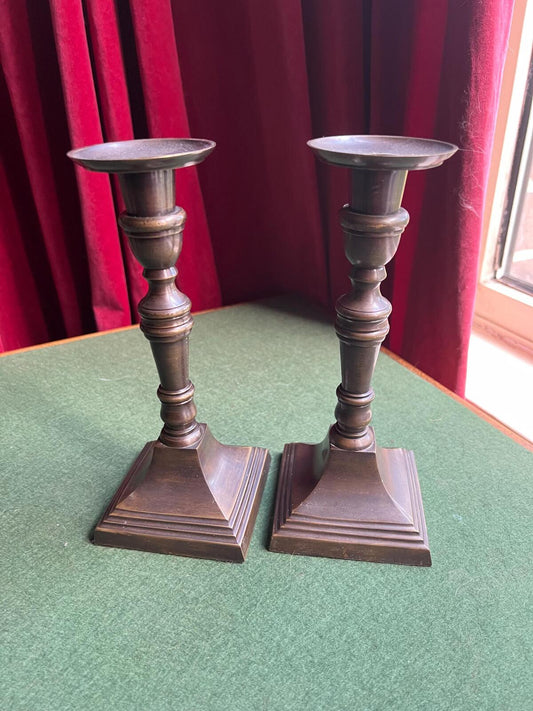 Vintage antique brass candlestick pair. Beautiful square based pillar candlesticks. Decorative brass great patina unpolished candle holders.