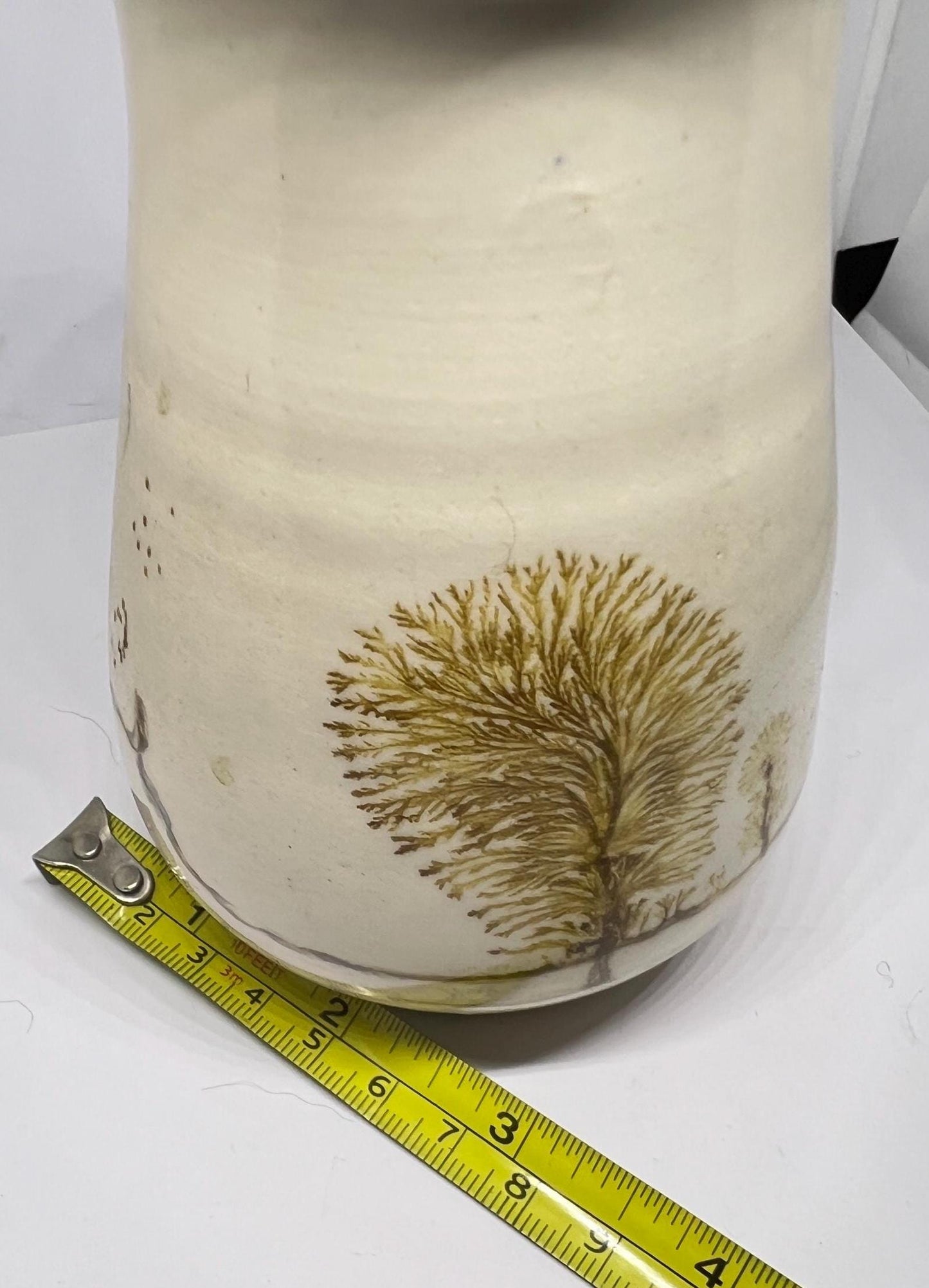 Studio pottery Mochaware lidded pot Cream glaze with tree design.