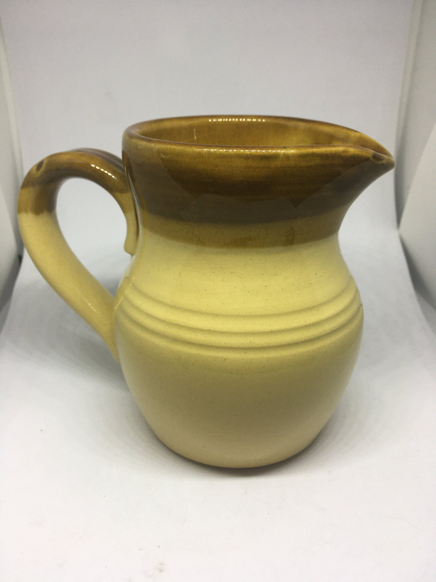 Ceramic Milk Water jug TG Green Church Gresley. Brown glaze.
