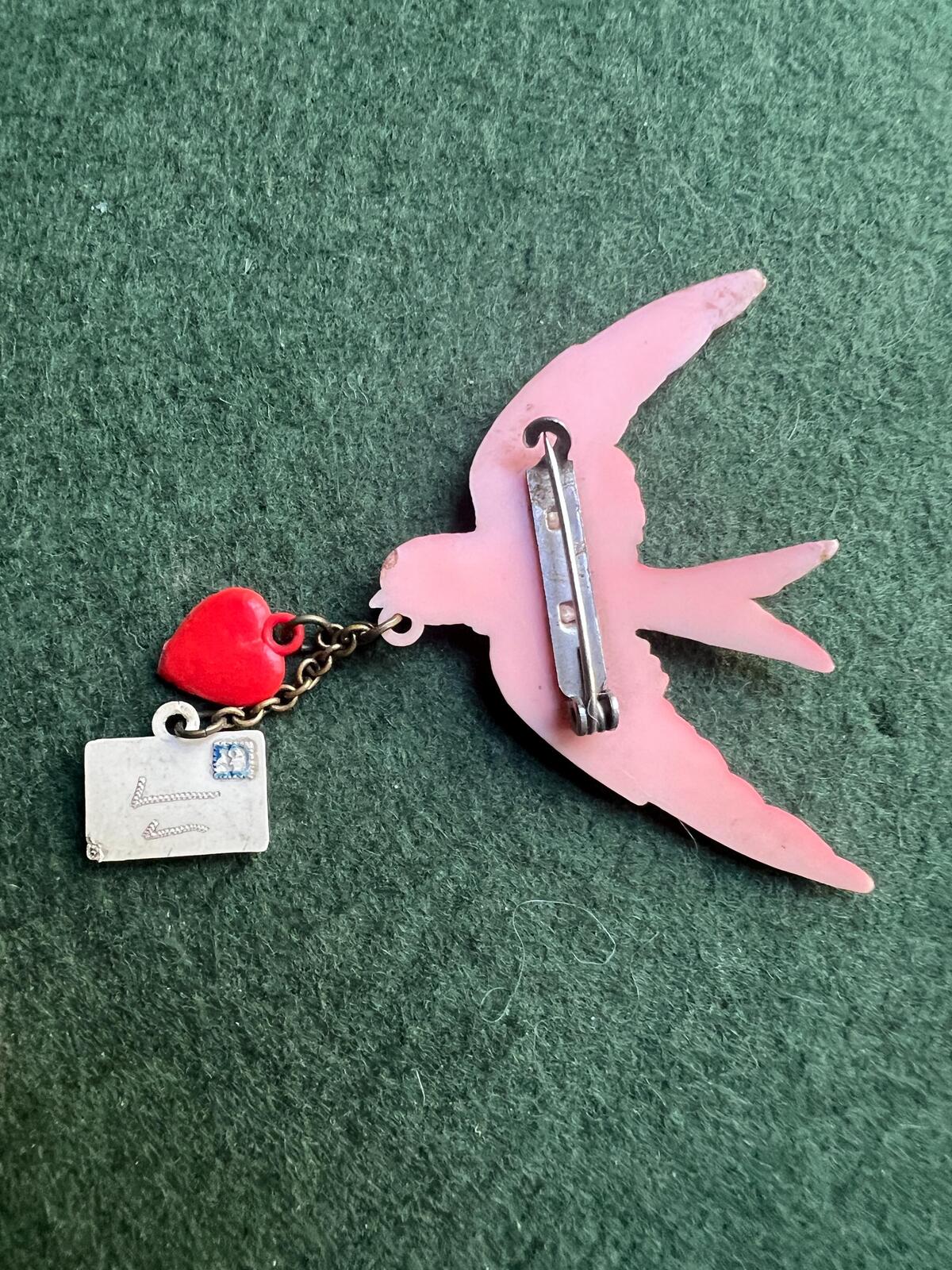 Vintage celluloid swallow bird brooch. Red bird with heart and envelope. Jewellery lover gift.