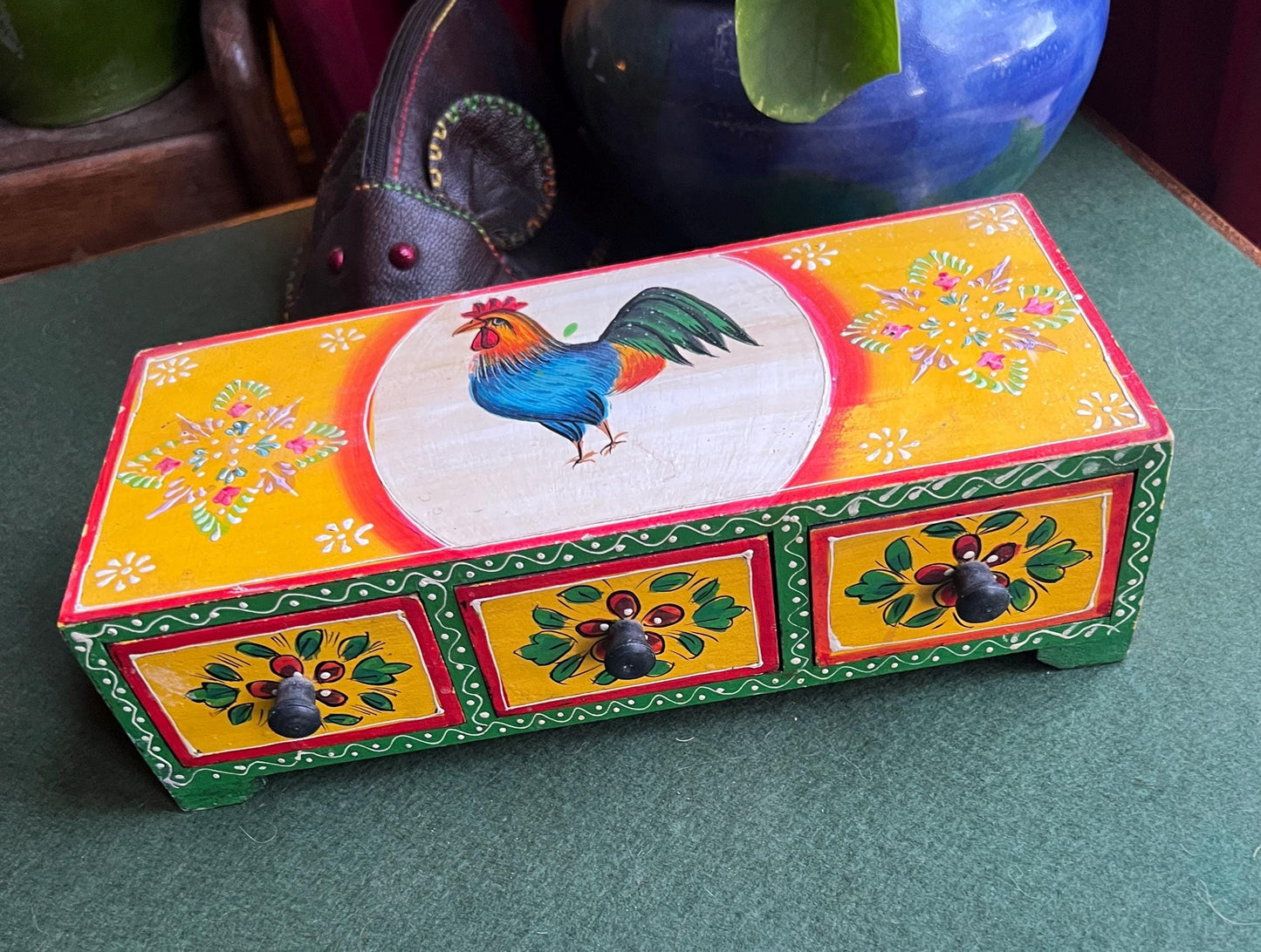 Retro kitchen hand painted rooster design spice drawers.
