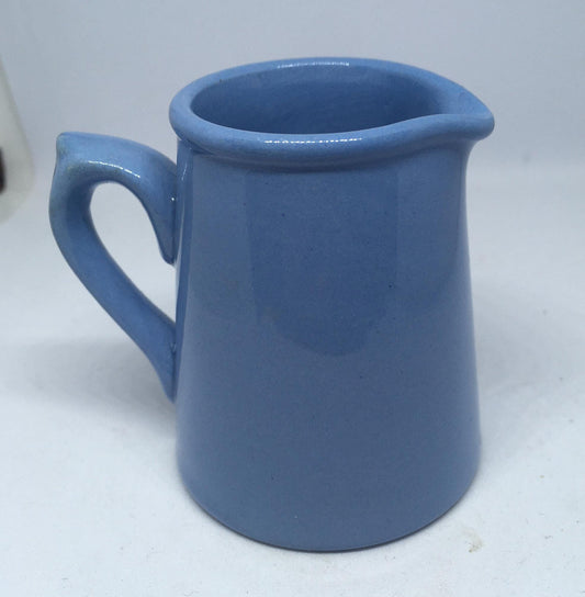 Vintage blue ceramic creamer milk jug. Stamped Dudsons Hanley Made specially for for Coopers & Sons Stores Ltd.