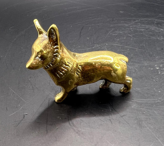 Brass Corgi dog paperweight figurine.