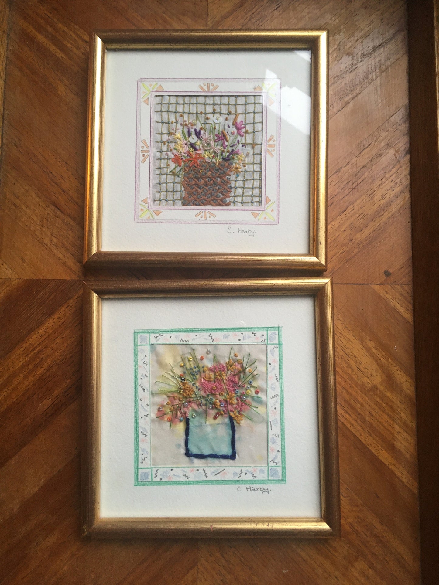 2 Beautiful detailed framed embroidery flower scenes. Signed C Haxby. Portfolio of Yarm.