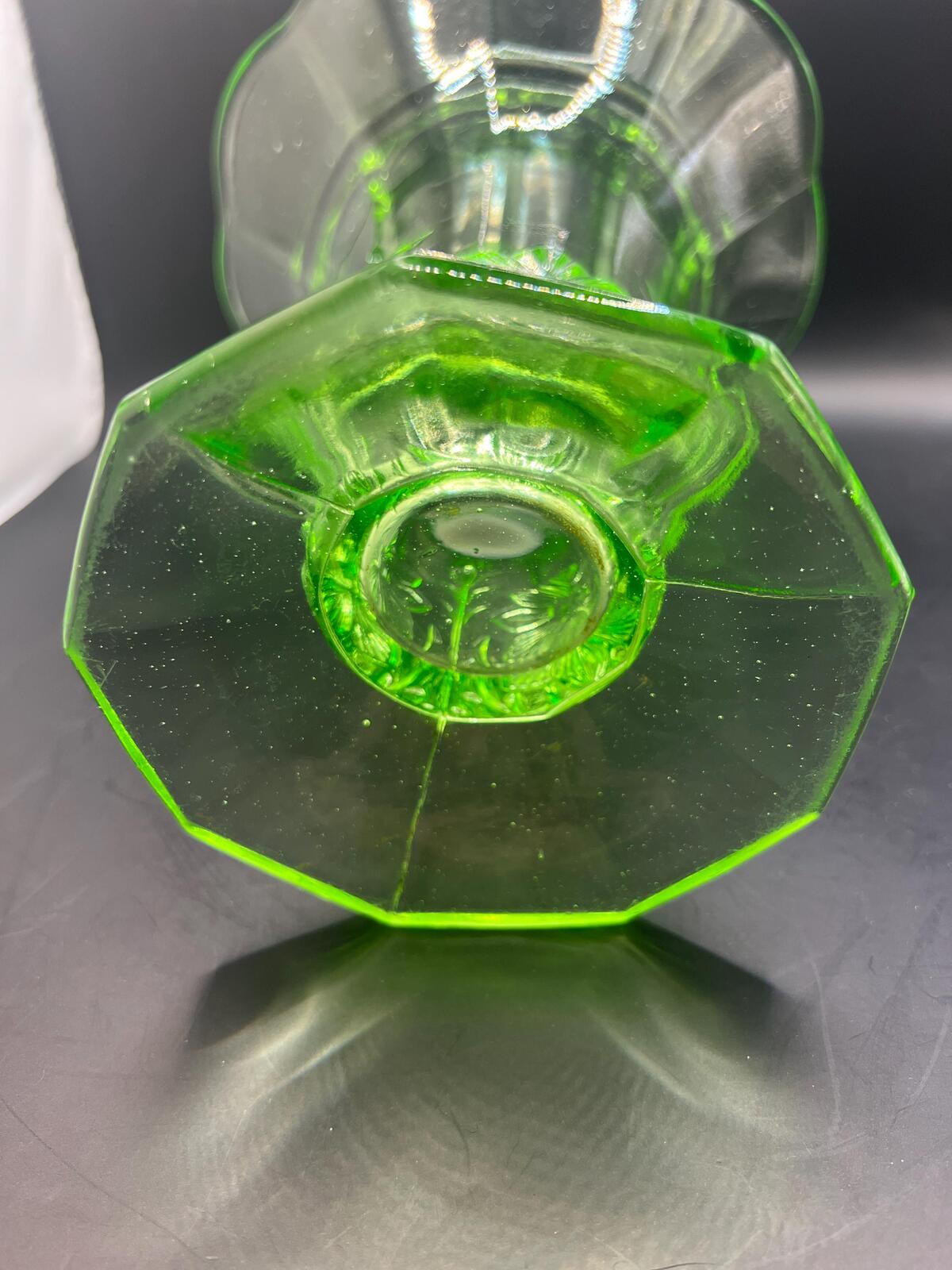 Vintage antique uranium glass vase. Octagonal base with flared ruffle rim and floral imprint.