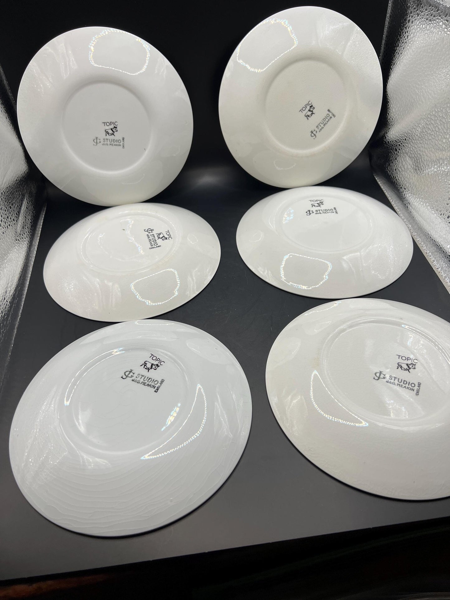 Set 6 side plates and cake sandwich plate. Topic pattern Stamped JG Meakin.