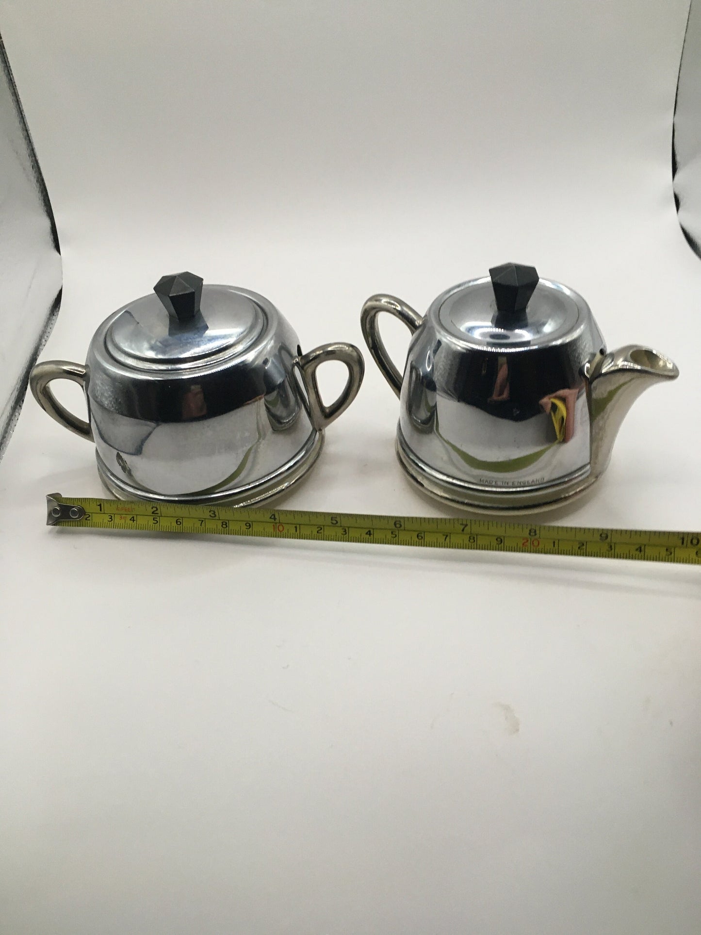 Vintage ceramic and metal insulated creamer and covered sugar bowl.