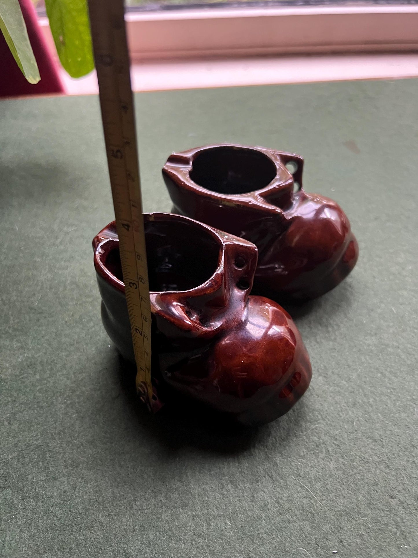 Vintage ashtray boots. Deep brown glaze.