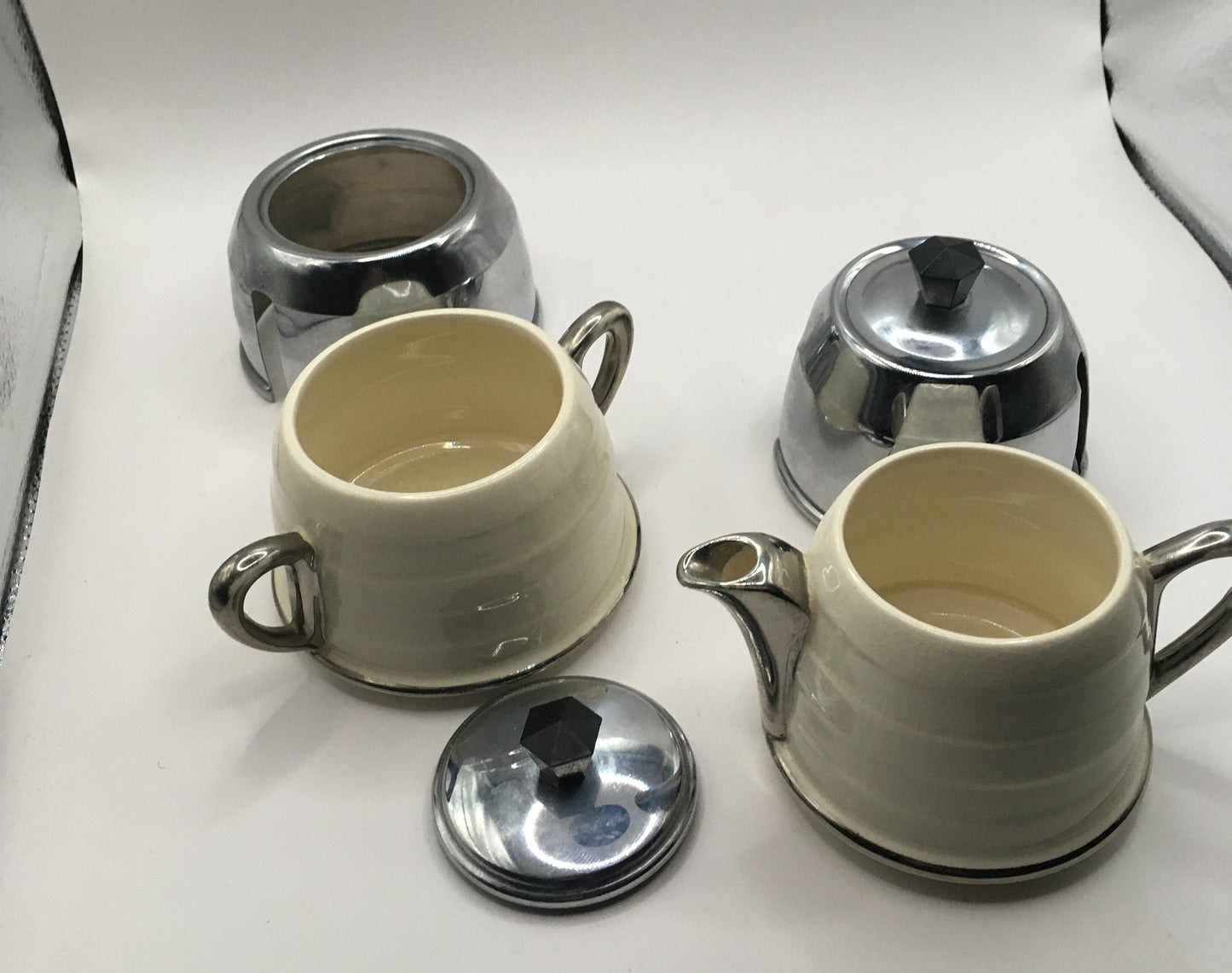 Vintage ceramic and metal insulated creamer and covered sugar bowl.