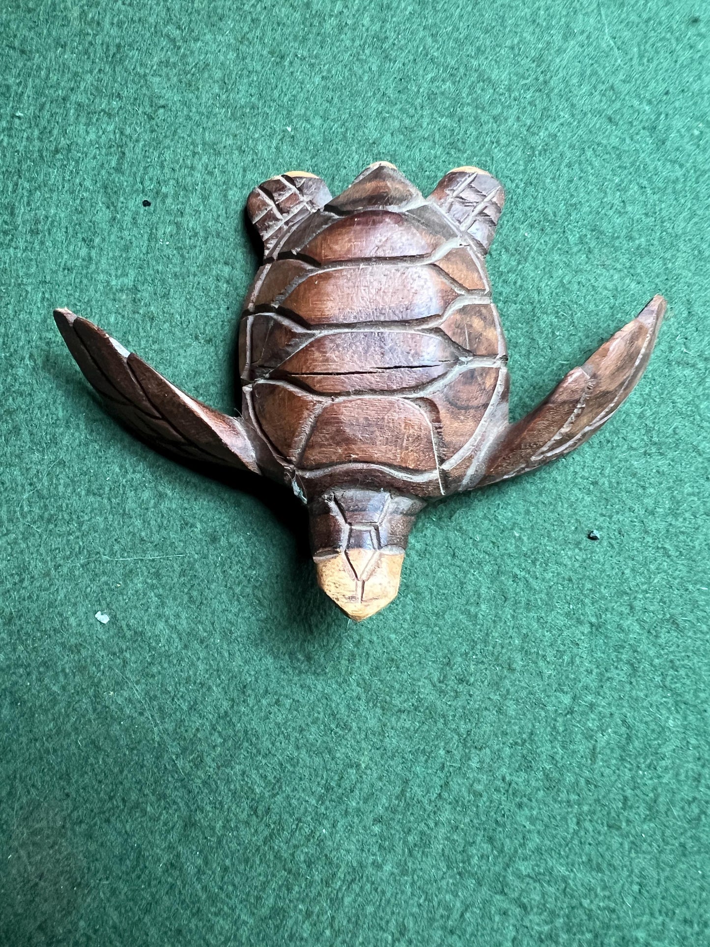 Hand carved Monkey wood swimming turtle figure.