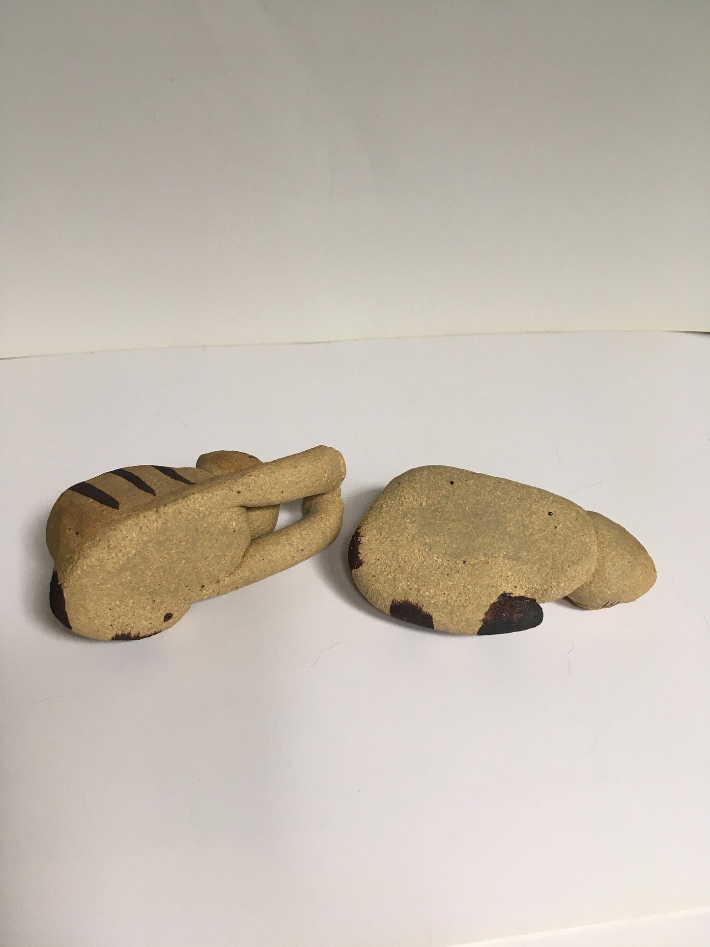 Cat figurines.