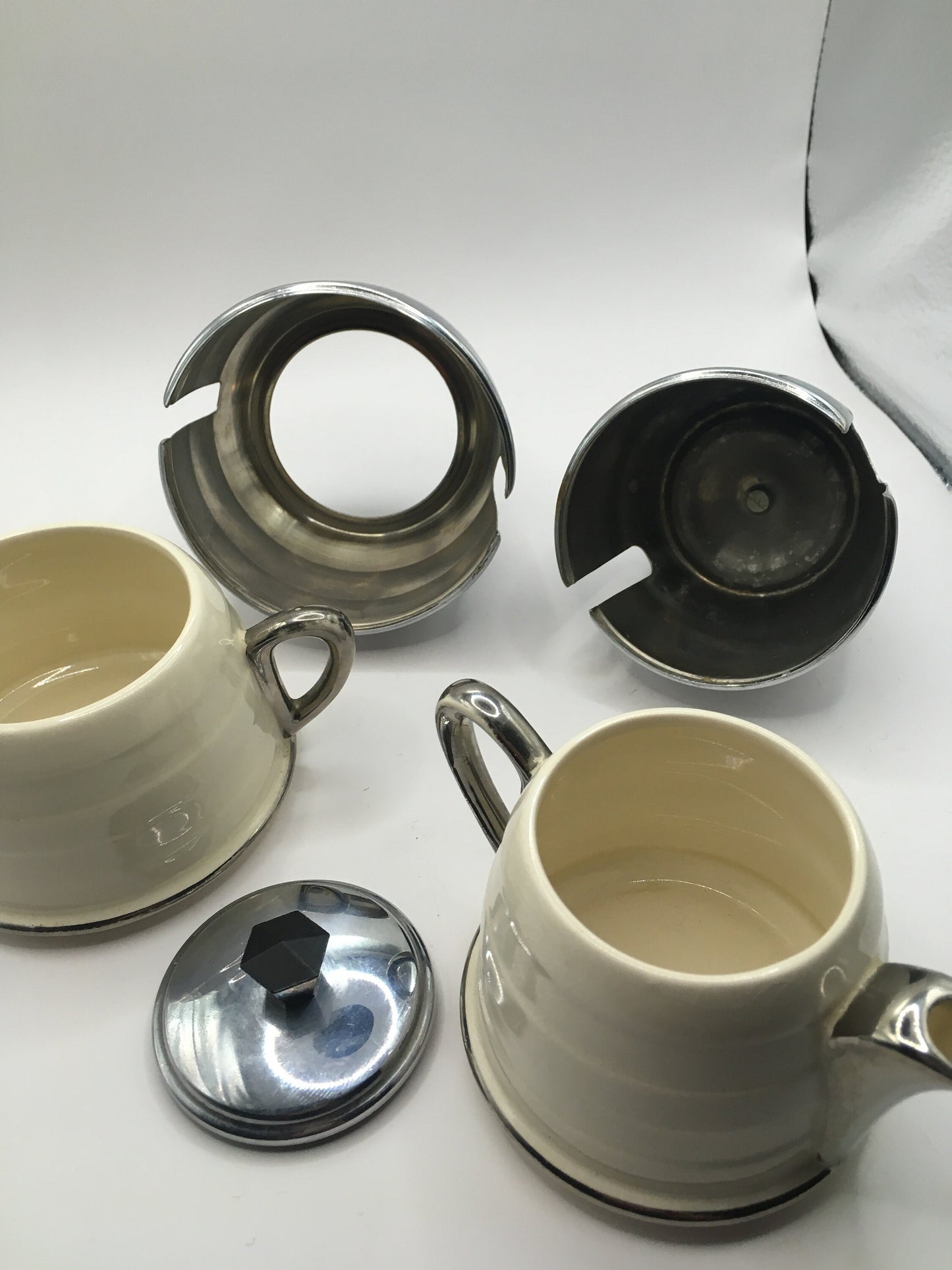 Vintage ceramic and metal insulated creamer and covered sugar bowl.