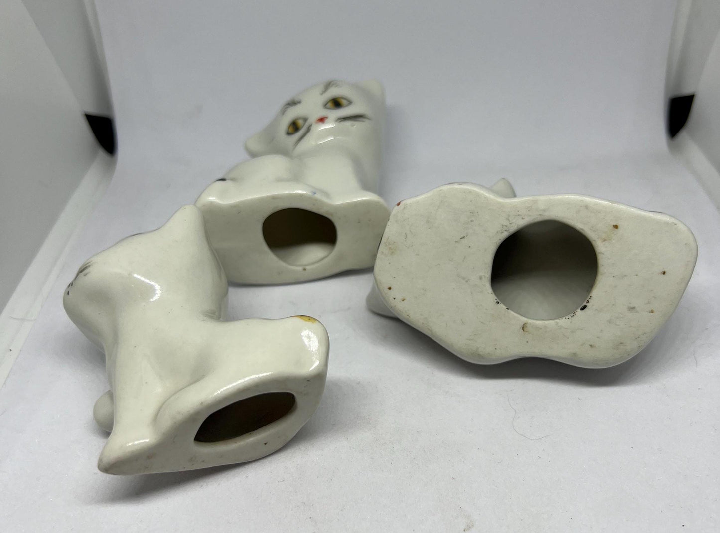 Cat family figurines. Ceramic cat ornaments
