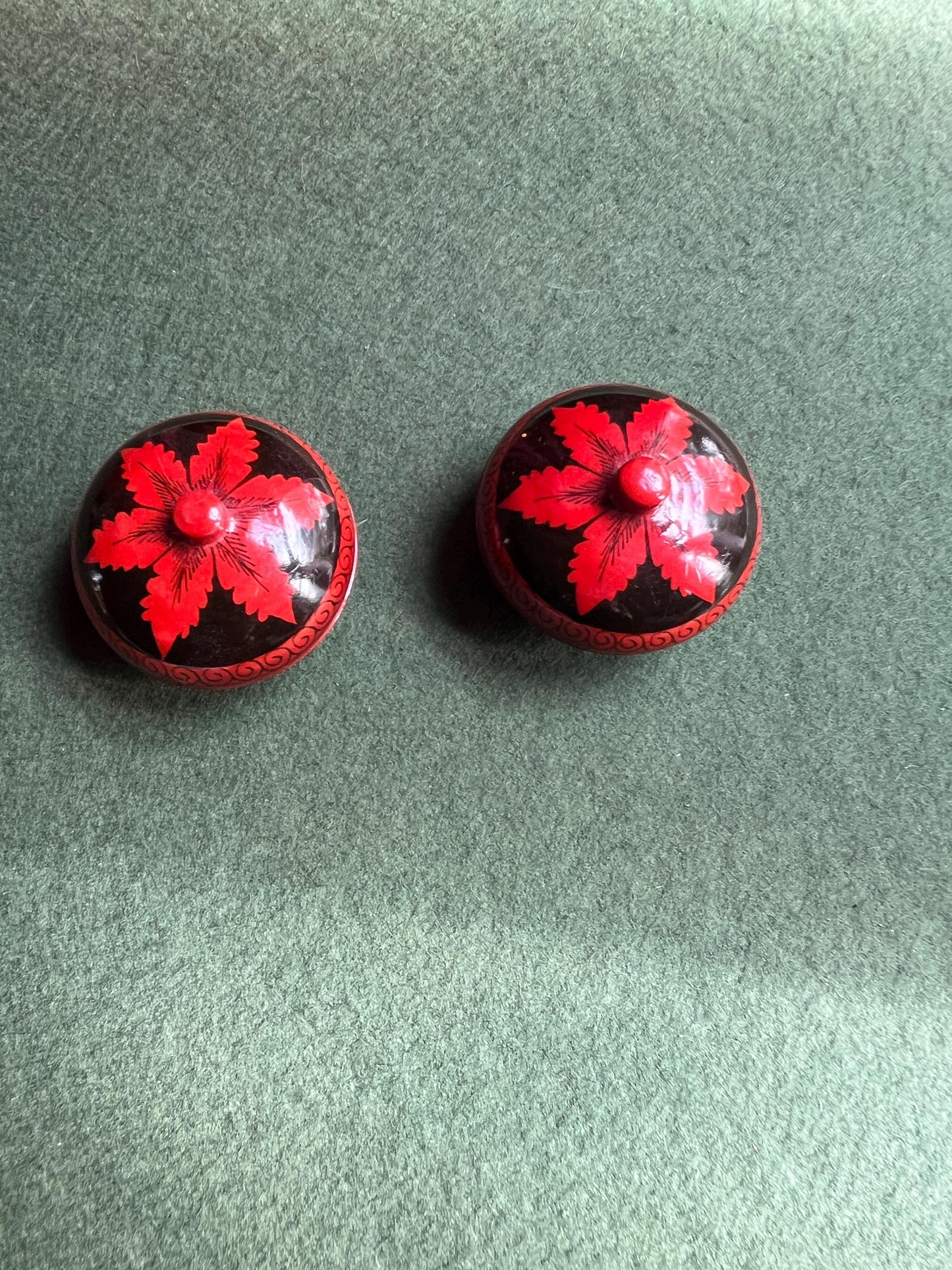 Pair of red and black lacquered lidded boxes. Tiny trinket ring boxes. Sold as a pair.