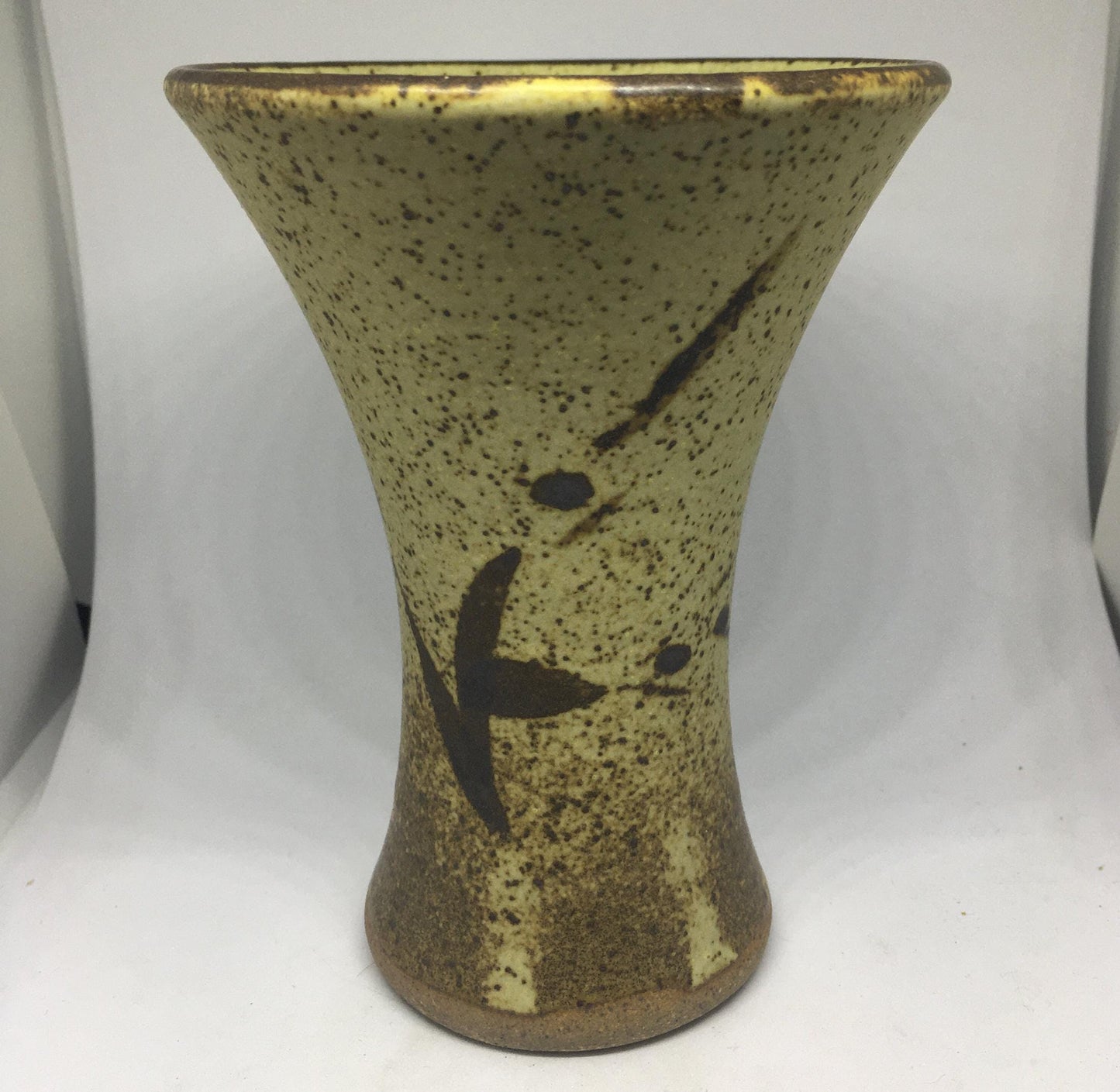 Vintage stoneware trumpet vase with abstract design. Speckle glazed mid century flower display vase.
