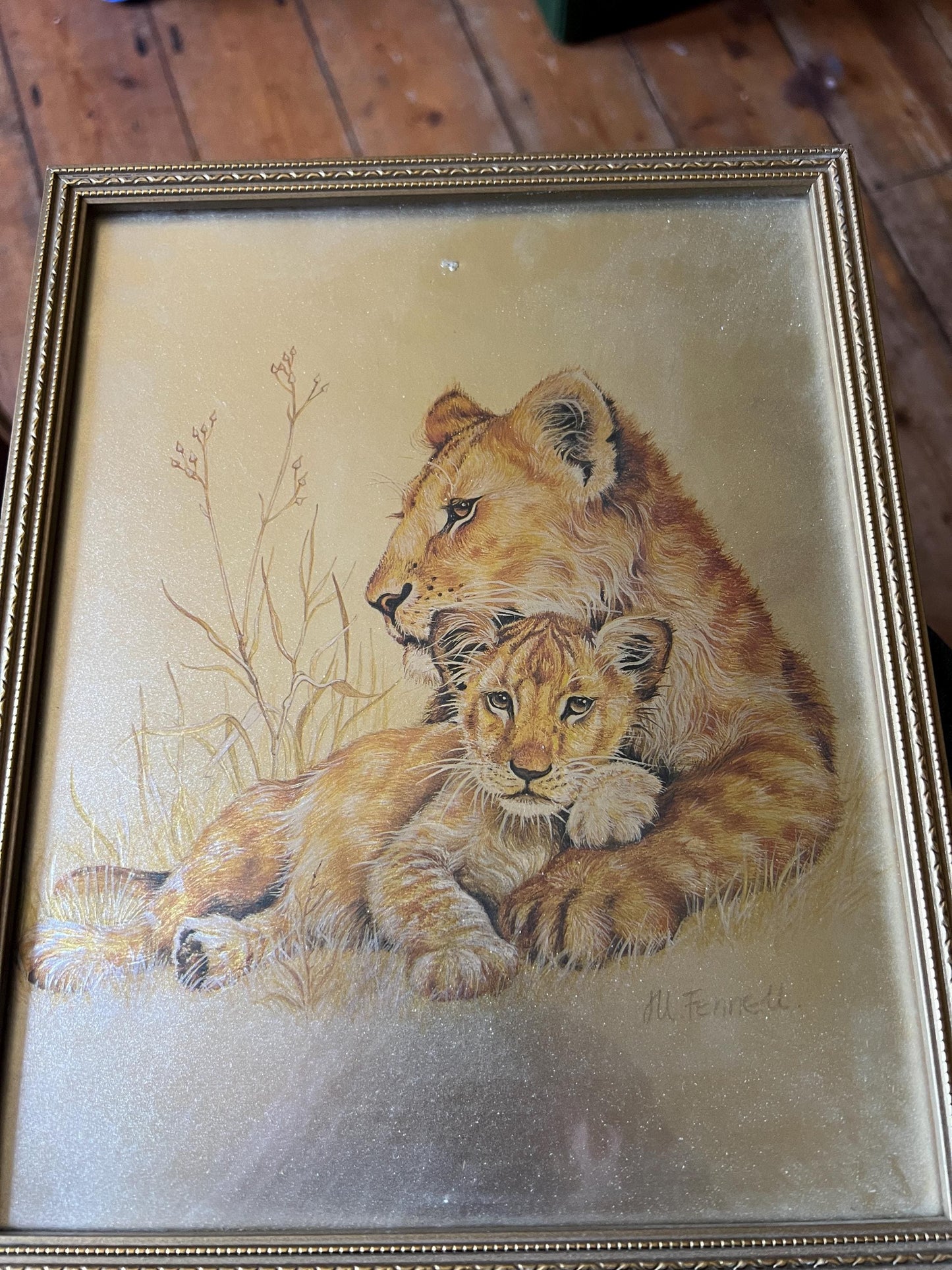 Lion and cub foil art framed picture. Signed M Fenelle