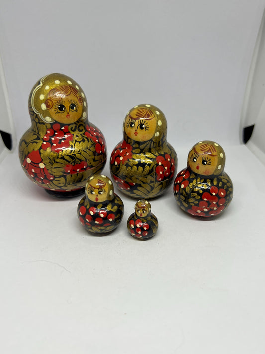Vintage Matryoshka nesting doll. Hand painted 5 piece Russian nesting doll.