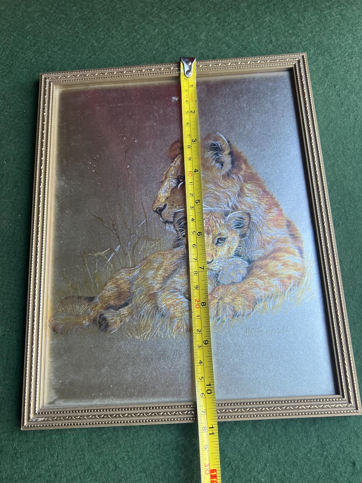 Lion and cub foil art framed picture. Signed M Fenelle